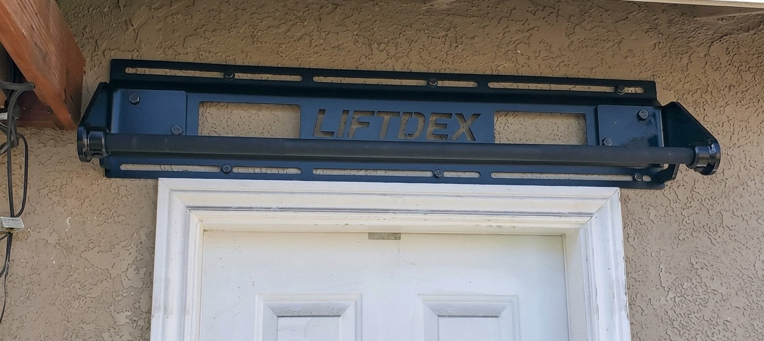 HETDEX license plate holder attached to a door