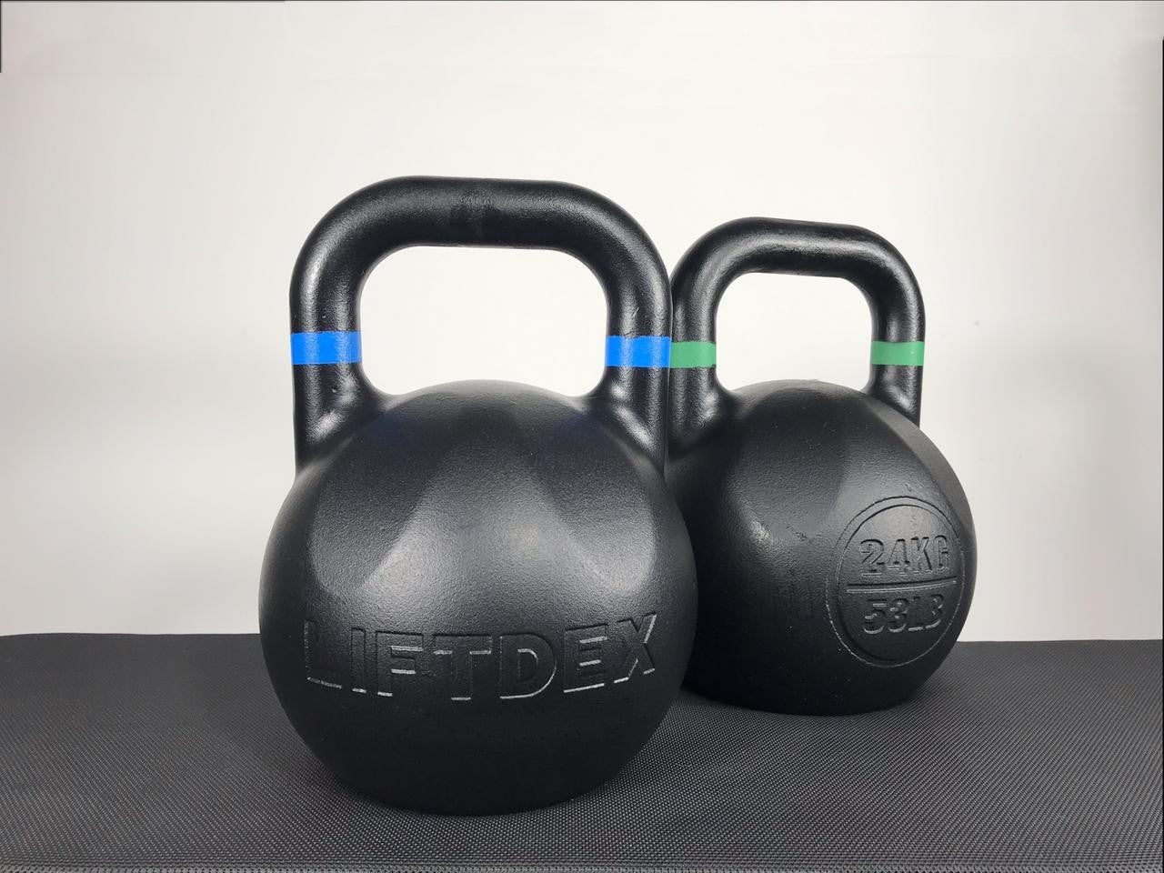 Two black kettlebells with 'LIFTDEX' branding on a gray background
